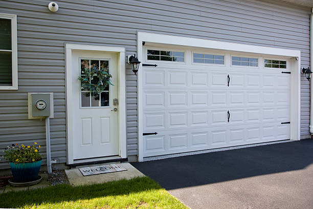 24/7 Emergency Garage Door Panel Replacement experts in WaKeeney, KS
